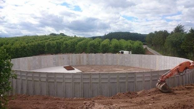 Precast concrete panels can be used to quickly build anaerobic digestion tanks and cut down on construction costs to build the tank walls.