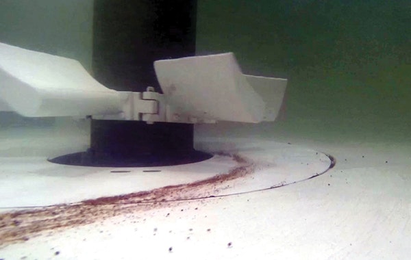 This underwater image demonstrates how incoming grit efficiently sweeps along the grit chamber’s flat floor for easy removal